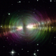 A false-color image showing polarized light from the Egg Nebula. At its center, a star is slowly becoming a white dwarf.